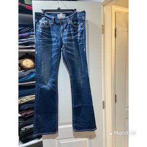 Women’s buckle jeans, size 31r